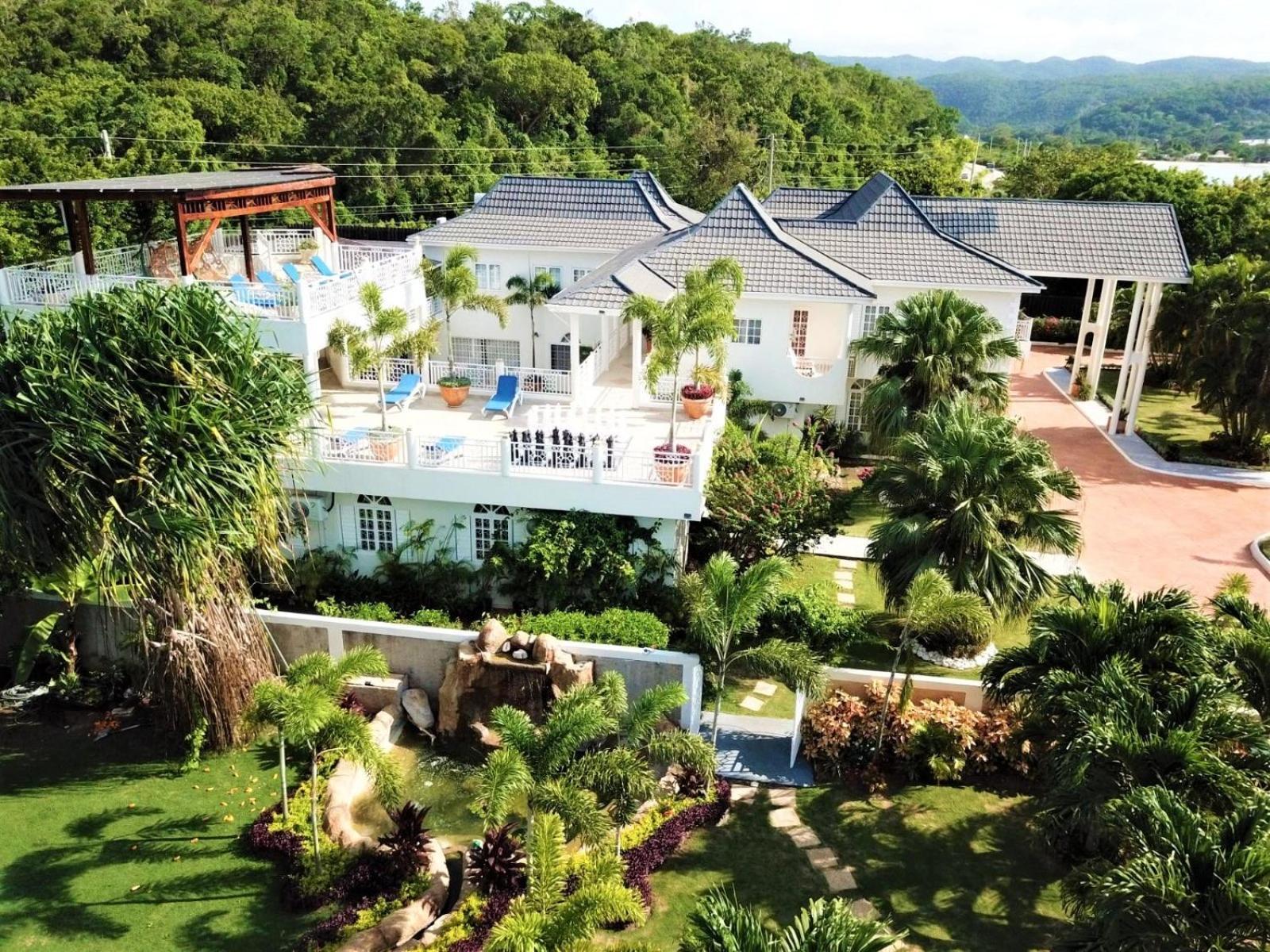 Mais Oui Tennis&Spa Villa Discovery Bay Extérieur photo